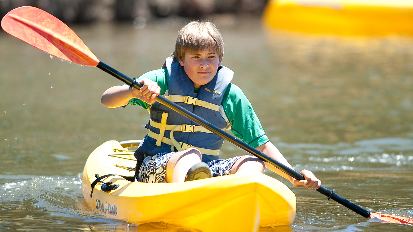 A boy in a kayak.